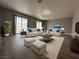 Comfortable living room featuring neutral colors, modern decor, and sliding glass door at 3340 Shallow Pond Dr, Las Vegas, NV 89117