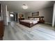 Serene main bedroom featuring a king-size bed and ensuite bathroom access at 3340 Shallow Pond Dr, Las Vegas, NV 89117
