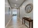 Hallway with wood-style flooring, decorative accents, and inviting living space at 379 Mano Destra Ln, Henderson, NV 89011
