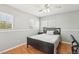 Second bedroom with hardwood floors and ceiling fan at 3966 Crystal Trip Ct, Las Vegas, NV 89129