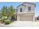 Charming two-story home featuring a well-maintained front yard and an attached two-car garage at 3966 Crystal Trip Ct, Las Vegas, NV 89129