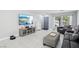 Beautiful living room with tile flooring, natural light, and seamless connection to front entry at 3966 Crystal Trip Ct, Las Vegas, NV 89129