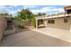 Spacious backyard featuring patio with decorative landscaping, perfect for outdoor enjoyment at 4016 Stormcrest Dr, Las Vegas, NV 89107
