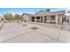 Wide view of backyard with concrete and open air patio at 4386 El Cebra Way, Las Vegas, NV 89121