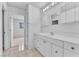 Bathroom featuring vanity with cabinets, countertop, and faucet at 4386 El Cebra Way, Las Vegas, NV 89121