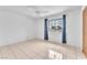 Bedroom with tile flooring, ceiling fan and large window at 4386 El Cebra Way, Las Vegas, NV 89121