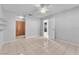Bedroom featuring tile floor, closet, shelves, and ceiling fan at 4386 El Cebra Way, Las Vegas, NV 89121