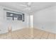 Bright bedroom featuring tile floors and ample light from the window at 4386 El Cebra Way, Las Vegas, NV 89121