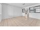 Spacious living room featuring tile flooring and abundant natural light at 4386 El Cebra Way, Las Vegas, NV 89121