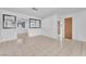 Bright living room with neutral walls and tile flooring at 4386 El Cebra Way, Las Vegas, NV 89121