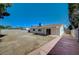 Expansive backyard with a covered patio, offering an ideal space for outdoor enjoyment at 4496 Skyview Dr, Las Vegas, NV 89104