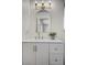 Updated bathroom featuring a new vanity, modern lighting, and a neutral aesthetic at 4496 Skyview Dr, Las Vegas, NV 89104