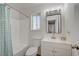 Bathroom with a vanity, modern mirror, and a shower/tub combo at 4496 Skyview Dr, Las Vegas, NV 89104