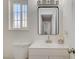 Bright bathroom featuring a vanity, and a window at 4496 Skyview Dr, Las Vegas, NV 89104