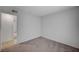 Empty bedroom with neutral carpet and a view to the hall at 4496 Skyview Dr, Las Vegas, NV 89104