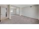 Bright bedroom featuring carpet and a mirrored closet, offering ample storage space at 4496 Skyview Dr, Las Vegas, NV 89104