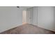 Bedroom with carpet, closet, and connecting door at 4496 Skyview Dr, Las Vegas, NV 89104