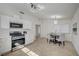 Open concept kitchen and dining area with modern appliances and stylish decor at 4496 Skyview Dr, Las Vegas, NV 89104