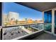 Balcony showcases expansive city views and modern architecture under clear blue skies at 4525 Dean Martin Dr # 909, Las Vegas, NV 89103