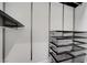Walk-in closet features metal shelving, drawers and pull-out storage baskets at 4525 Dean Martin Dr # 909, Las Vegas, NV 89103