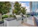 Outdoor grill area with stainless steel grills, a prep area and seating at 4525 Dean Martin Dr # 909, Las Vegas, NV 89103