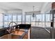 A modern kitchen featuring stainless steel appliances, granite countertops, and city views at 4525 Dean Martin Dr # 909, Las Vegas, NV 89103