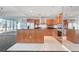 Modern kitchen featuring stainless steel appliances, wood cabinetry, and an island at 4525 Dean Martin Dr # 909, Las Vegas, NV 89103