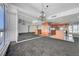 Bright, open living space featuring floor-to-ceiling windows, a chandelier, and a modern kitchen at 4525 Dean Martin Dr # 909, Las Vegas, NV 89103