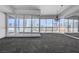 Spacious living area with cityscape views through large windows and modern fixtures at 4525 Dean Martin Dr # 909, Las Vegas, NV 89103
