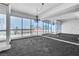 Spacious living room boasts floor-to-ceiling windows with panoramic cityscape views at 4525 Dean Martin Dr # 909, Las Vegas, NV 89103
