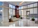 Bright and airy lobby with large windows and contemporary furnishings at 4525 Dean Martin Dr # 909, Las Vegas, NV 89103