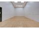 Empty racquetball court with wooden floor at 4525 Dean Martin Dr # 909, Las Vegas, NV 89103