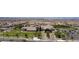 Aerial view of community center with lush landscaping, paved parking, and well-maintained lawns at 489 Open Hill Ave, Henderson, NV 89011