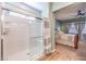 Clean bathroom with a glass-enclosed shower and views of the bedroom at 489 Open Hill Ave, Henderson, NV 89011