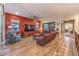 Comfortable living room boasting hardwood floors, ample seating, and a large entertainment center at 489 Open Hill Ave, Henderson, NV 89011