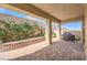 Spacious covered patio with a brick floor, perfect for entertaining with grill at 489 Open Hill Ave, Henderson, NV 89011