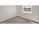 Neutral bedroom with a window at 5200 Blanton Dr, Las Vegas, NV 89122