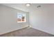 Neutral bedroom with a window at 5200 Blanton Dr, Las Vegas, NV 89122