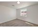 Neutral bedroom with a window at 5200 Blanton Dr, Las Vegas, NV 89122