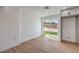 Bright room with luxury vinyl flooring, sliding door access to the backyard, and built-in cabinetry at 5200 Blanton Dr, Las Vegas, NV 89122
