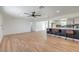 Spacious living room featuring a kitchen counter with stools and open floor plan at 5200 Blanton Dr, Las Vegas, NV 89122