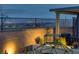 Outdoor living space with playset, lounge area, and scenic city views at 5234 Savannah Rose St, Las Vegas, NV 89149