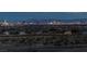 Sweeping Las Vegas skyline view from a new home community; desert landscape in foreground at 5234 Savannah Rose St, Las Vegas, NV 89149