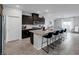 Spacious kitchen with a large island, barstool seating, and modern appliances at 5234 Savannah Rose St, Las Vegas, NV 89149
