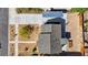 Aerial view of a single-story home with a xeriscaped front yard, covered parking, and gray roof at 524 Hopi Pl, Boulder City, NV 89005