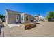 Image of the backyard, featuring a wood-framed garden area at 524 Hopi Pl, Boulder City, NV 89005