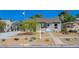 Charming single-story home featuring a well-maintained yard and a convenient covered parking area at 524 Hopi Pl, Boulder City, NV 89005