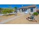 Inviting single-story home displaying a tidy xeriscaped yard and a simple walkway to the entrance at 524 Hopi Pl, Boulder City, NV 89005