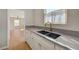 Kitchen sink featuring gold faucet with hardwood floors and natural light at 524 Hopi Pl, Boulder City, NV 89005