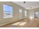 Bright living room features wood-look tile floors, natural light and a neutral color palette at 524 Hopi Pl, Boulder City, NV 89005